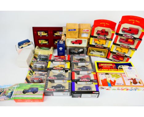 Corgi - Lledo - James Bond - 27 x boxed / carded models and sets including The Living Daylights Aston Martin # 99261, Morris 