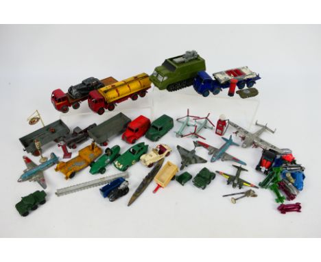 Dinky - Charbens - Matchbox - A collection of models including York Airliner # 704, Foden tanker # 504, Shado 2 # 353 and oth