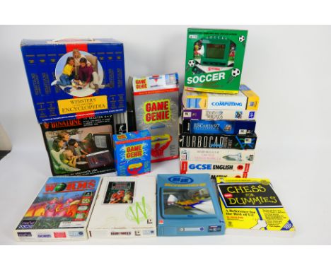 Binatone - Sega - Nintendo - Systema - Ocean - Microsoft - Other - A boxed vintage Binatone TV game system with a handheld Sy