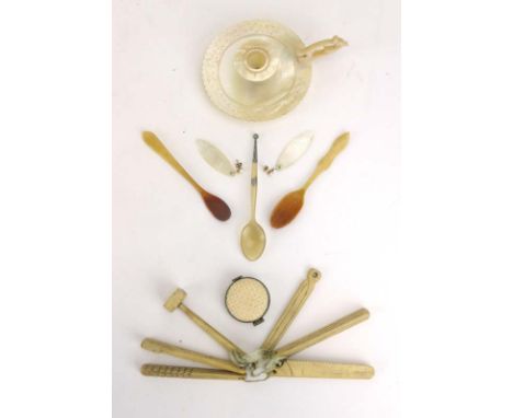 A 19th century bone teething rattle modelled as six ships carpenter's tools, together with a mother-of-pearl chamberstick, sp
