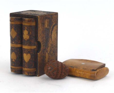 A 19th century coquilla nut treen flea catcher, together with a poker ware games card case and a walnut snuff box