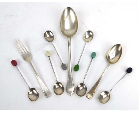 A set of six silver bean end coffee spoons, a silver fork, teaspoon and dessert spoon, various dates and makers, overall 3.5 