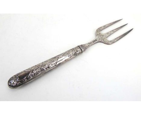 A late Victorian silver bread fork, the handle repousse decorated in the Neo-Classical manner, maker WG&amp;S, Sheffield 1898