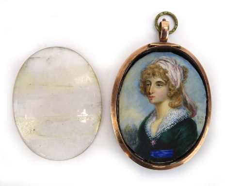 An oval portrait miniature depicting a young female wearing a green dress, signed RC (possibly R. Cosway), and dated 1789, ho