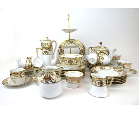 A 1940's Noritake tea/coffee service gilt decorated in the 'Basket of Flowers' pattern on a white ground, pattern no. 44318 (