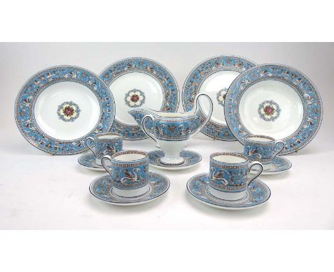 A Wedgwood Florentine pattern part dinner service (qty) CONDITION REPORT: Some damage including 1 missing cup, a chip on a sa