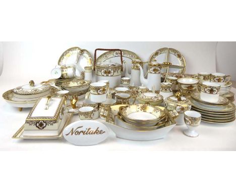 A 1940's Noritake tea/coffee service gilt decorated in the 'Basket of Flowers' pattern on a white ground, pattern no. 44318  