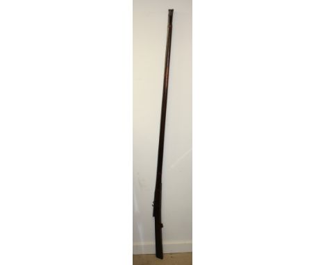 An Indian matchlock toradar, 138.5cm barrel with lotus choke, marked PR/EXR/214858, iron ramrod, hardwood full stock, 188cm l