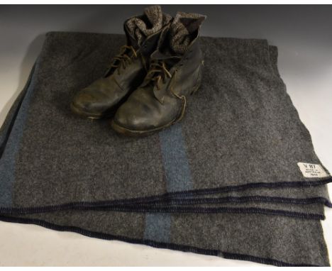 A pair of World War II British army ammunition boots, with impressed WD markings; an Australian V87 army issued blanket, date