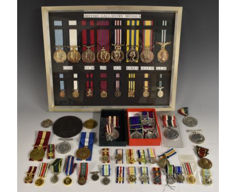 Medals, British Gallantry Awards, a collection of eight facsimile copies, George VI to Elizabeth, arranged above their respec