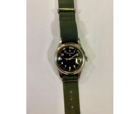 A 1948 Jaeger-LeCoultre stainless steel British Military mark 11 wristwatch, the matt black second generation broad arrow dia