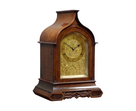 Small early Victorian rosewood mantel clock, Gothic arched case with spire finial, arched brass Roman dial with chased scroll