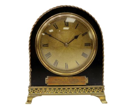 Edwardian ebonised mantel clock, dome top with engine turned gilt metal dial, twist beading and Greek key edging with splayed