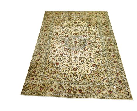 Large Persian Kashan cream ground rug carpet, interlacing blue floral field, stylised flower head decoration, 407cm x 300cm  