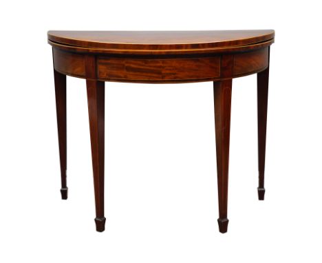 George III figured mahogany card table, demi-lune top lined with baize, square tapering supports with spade feet, box wood st