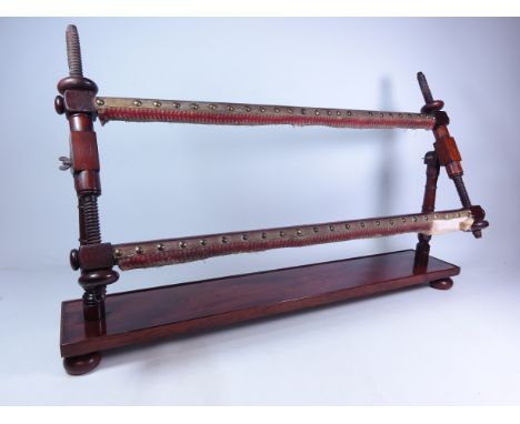 Victorian mahogany adjustable tapestry frame, on ring turned tapering supports and platform base with bun feet, W89cm, H48cm,