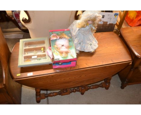 An Ercol elm drop leaf coffee table 