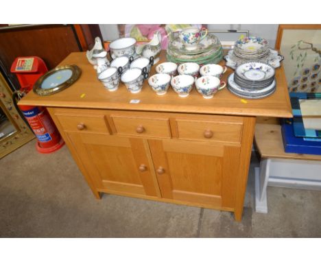 An M&S light oak sideboard 