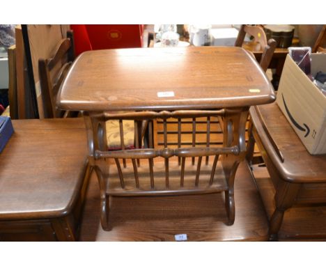 An Ercol magazine table 