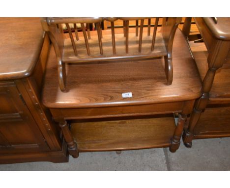 An Ercol elm two tier side table 
