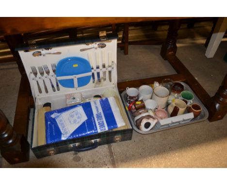 A picnic hamper and a tray of various china 