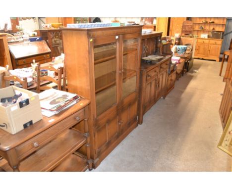 An Ercol glazed display cabinet 