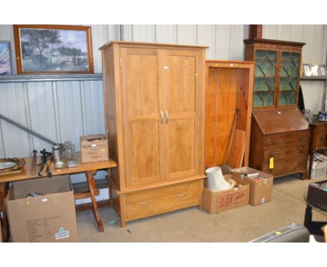 A modern light oak double wardrobe 