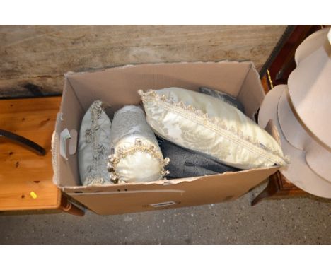 A box of cushions and a quantity of lamp shades 