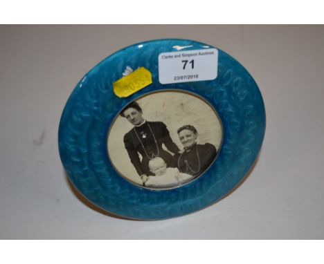 A blue enamel decorated circular photo frame and a bead work purse 