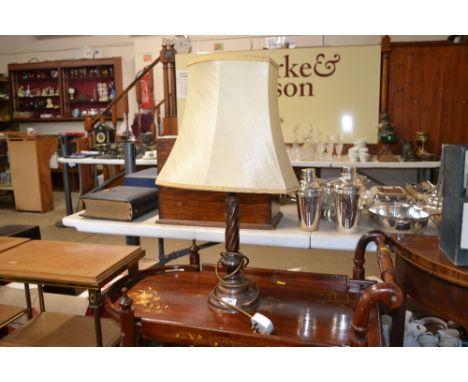 A copper table lamp and shade 
