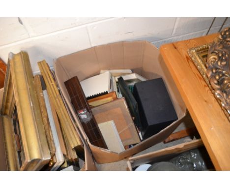 A box of books; and a cribbage board and pictures 