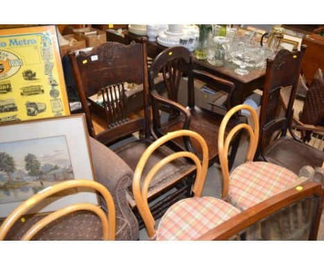 A pair of continental style stick back chairs; together with a 19th Century elbow chair 