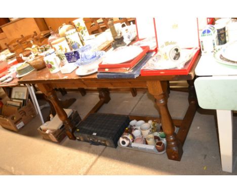 A pine refectory style dining table; and a set of six oak and ladder back chairs 