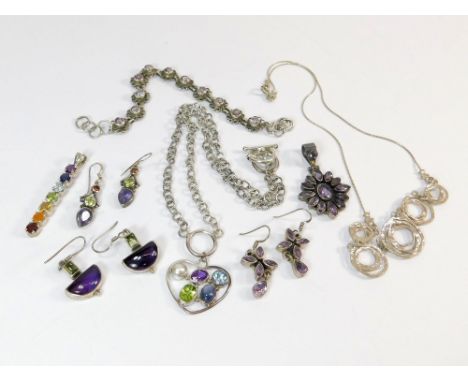 SILVER NECKLACES ETC. A silver necklace, the heart shaped drop set with amethyst, peridot, pearl etc. & one other hand made s