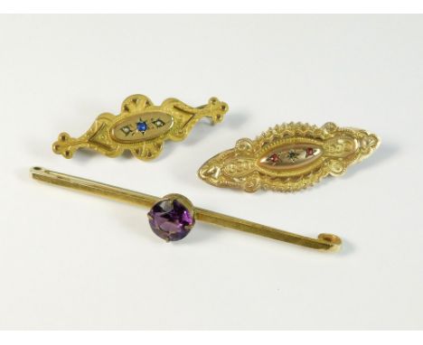 GOLD BROOCHES. Three 9ct. gold bar brooches (ruby brooch lacks central pearl & pin). Gross weight approx. 9.2g.  Please note 
