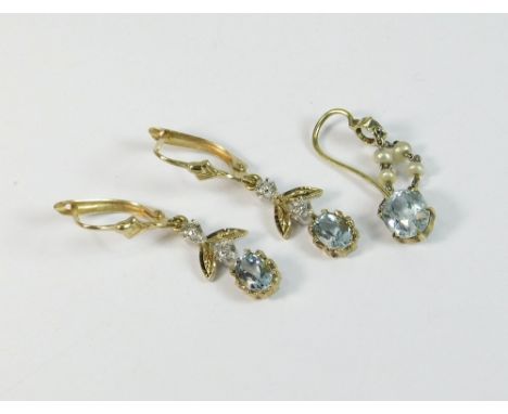 AQUAMARINE EARRINGS ETC. A pair of modern 9ct. gold, diamond & blue stone drop earrings. Also, a single aquamarine & seed pea