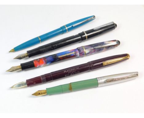 FOUNTAIN PENS ETC. Two Osmiroid, lever filled fountain pens, a green Queensway fountain pen, a Platignum lever filled fountai