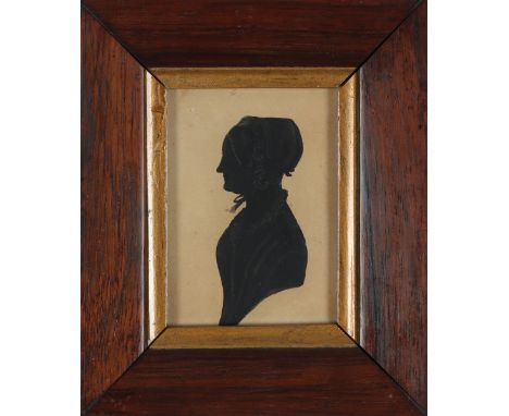 λEnglish School 19th Century A pair of portrait silhouettes in profile of a lady and gentleman Each rectangular, in rosewood 