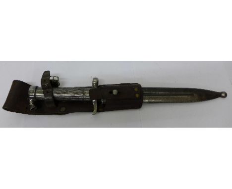 A bayonet with metal handle, metal scabbard and leather frog