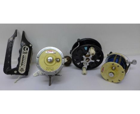Three fishing reels including Garcia Mitchell 602 and 624 and a K-tel Fishin' Magician