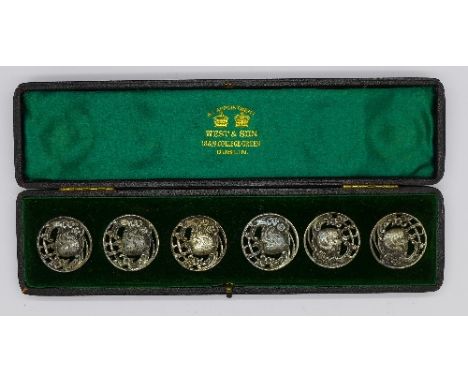 A cased set of six Art Nouveau buttons