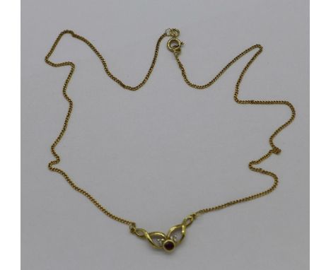A 9ct gold, diamond and ruby necklace, 2.6g