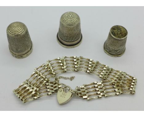 Three silver thimbles, one a/f and a silver gate bracelet