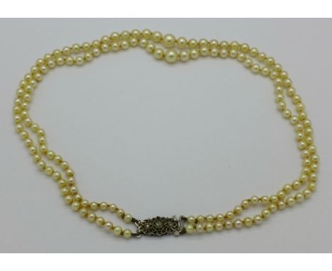 A double row cultured pearl necklace