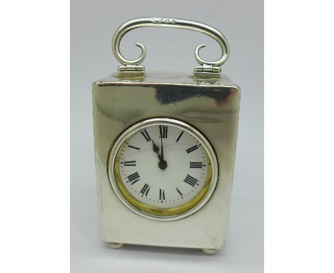 A silver cased carriage clock, Goldsmiths & Silversmiths, London 1920, dial a/f