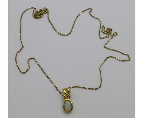 A 9ct gold and opal pendant on a fine 9ct gold chain, 2.1g