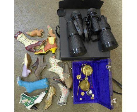 A pair of Super Zenith 10 x 50 binoculars, a cased set of scales and a collection of novelty shoe trinkets