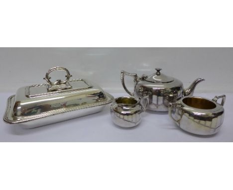 A three piece plated tea service and a tureen 