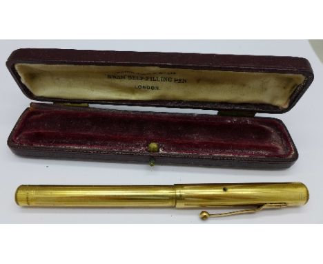 A Swan Mabie Todd gold plated fountain pen with 14ct gold nib, boxed