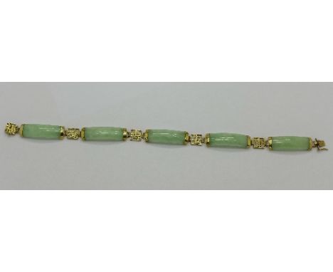 A 9k gold and jade bracelet